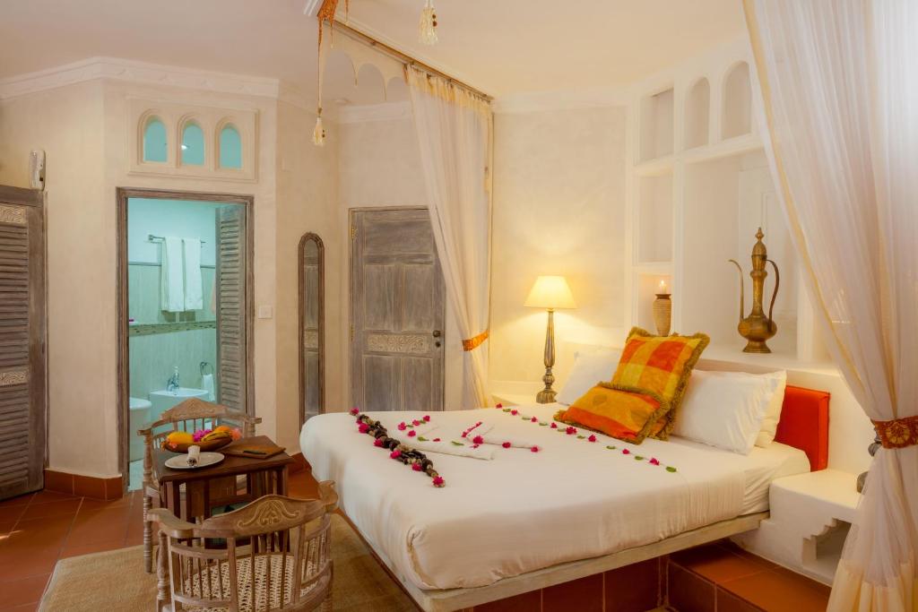 The Maji Beach Boutique Hotel booking by crystal tours kenya bed